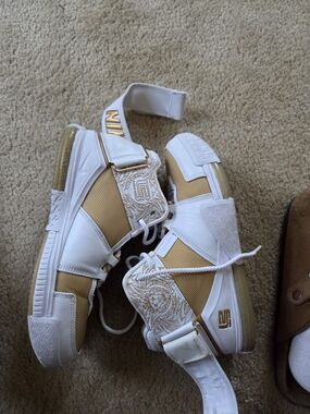 Nike Lebron's Gold and White Low-Top Sneakers with Decorative Strap